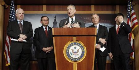 U.S. senators attend a news conference at Capitol on immigration reform in Washington