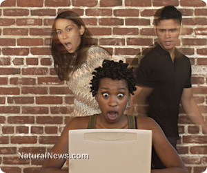 Woman-Shocked-Computer-Work-Business